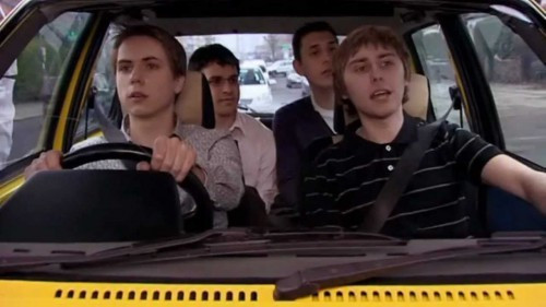 Screenshot from “The Inbetweeners” where the four main characters are in the car.